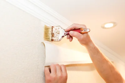 Pose de papier peint aux Corvées-les-Yys — revêtements muraux et toiles de verre